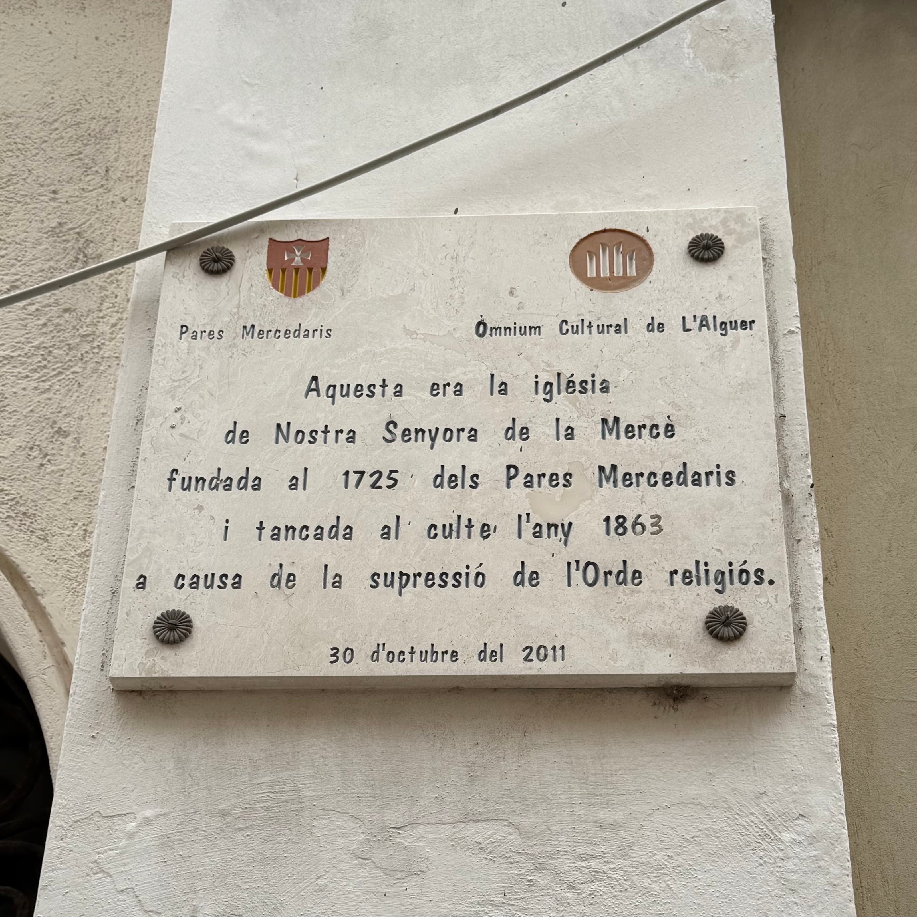 Street plaque in Alguerese Catalan